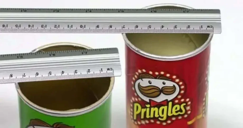  A can of Pringles beside a ruler, illustrating practical applications of knowing Pringles can dimensions for various uses.