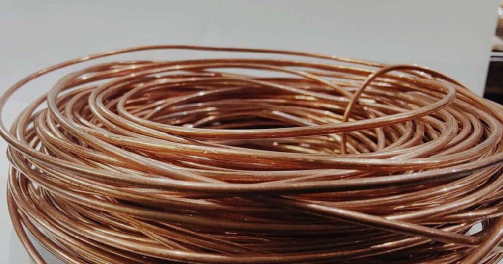 Close-up of 2mm copper wire, showcasing its smooth texture and conductivity for various electrical applications.